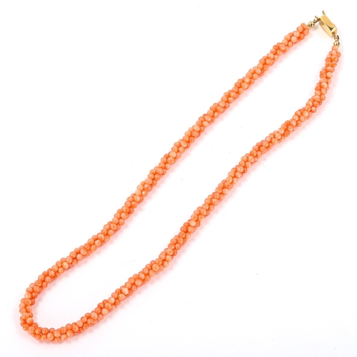 241 - A coral bead torsarde necklace, with unmarked yellow metal clasp, necklace length 40cm, 20.4g