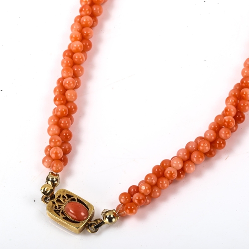 241 - A coral bead torsarde necklace, with unmarked yellow metal clasp, necklace length 40cm, 20.4g