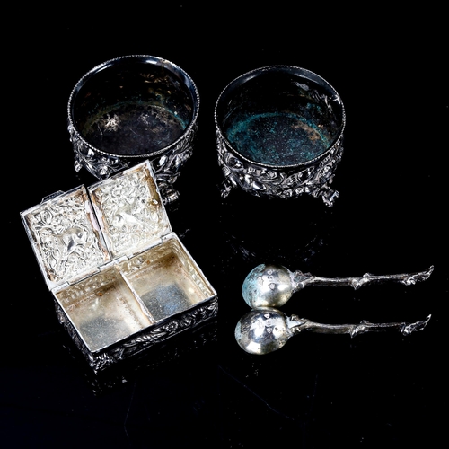 265 - A pair of Victorian silver salt cellars and branch spoons, retailed by Mappin & Webb, and a small si... 