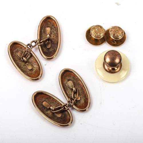 267 - An early 20th century 9ct rose gold dress set, comprising pair of cufflinks, 2 studs and button, eng... 