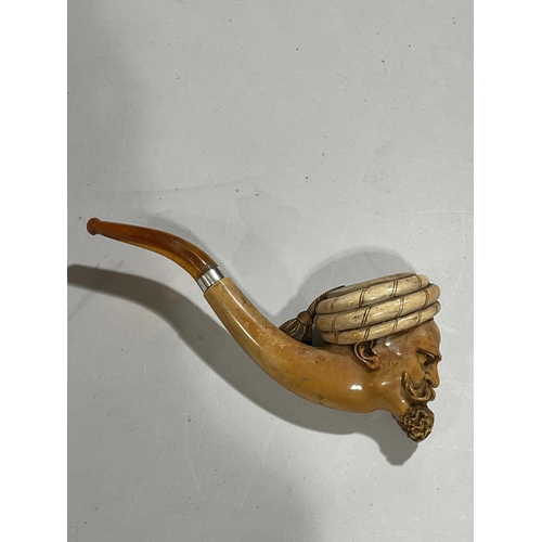 1305 - A large 19th century carved Meerschaum pipe, in the form of an Arab man wearing a turban, silver and... 