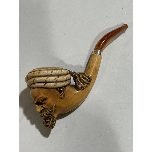 1305 - A large 19th century carved Meerschaum pipe, in the form of an Arab man wearing a turban, silver and... 