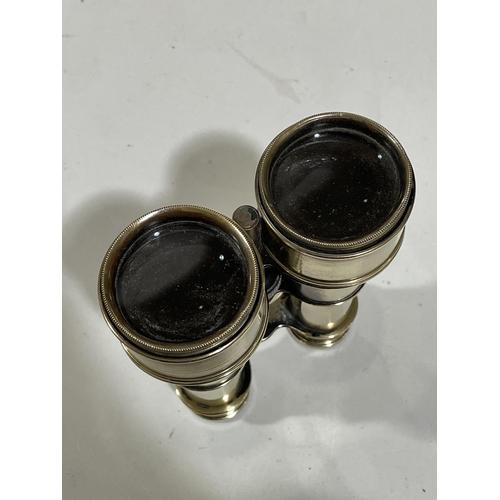 1309 - A pair of Victorian polished brass binoculars with telescopic shades