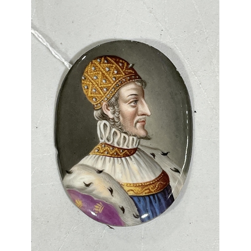 1310 - A 19th century painted porcelain plaque, depicting a Medieval bishop, 5.5cm x 4.5cm