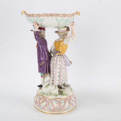 1298 - A Meissen porcelain comport, supported by children figures, height 19cm