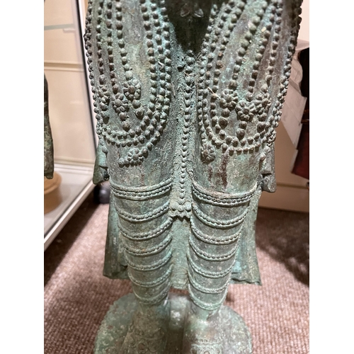 1130 - A large Indian verdigris bronze standing Buddha, height 73cm