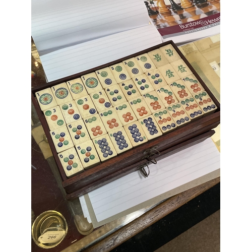 1227 - A Chinese bone and bamboo Mahjong set, in original brass-bound hardwood cabinet, with brass carrying... 