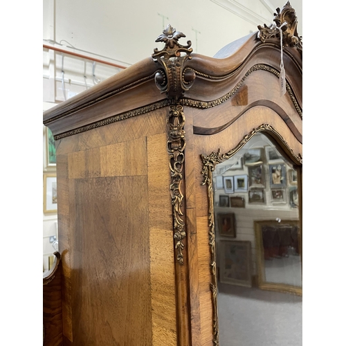 1289 - An ornate 19th century walnut and marquetry inlaid vitrine cabinet, flanked by smaller side cabinets... 