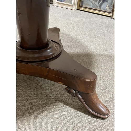 1313 - A 19th century Manx circular mahogany tilt-top dining table on stylised platform base, diameter 125c... 