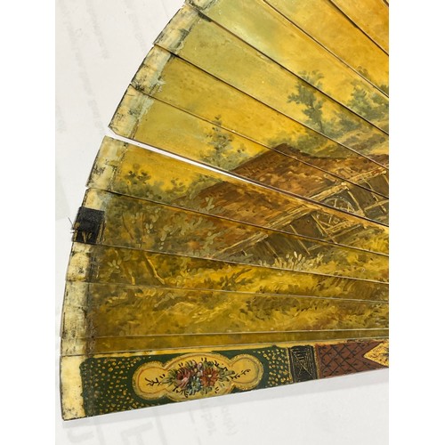 1185 - A 19th century hand painted ivory fan, length 18.5cm, and a bone arrow design fan with pierced decor... 