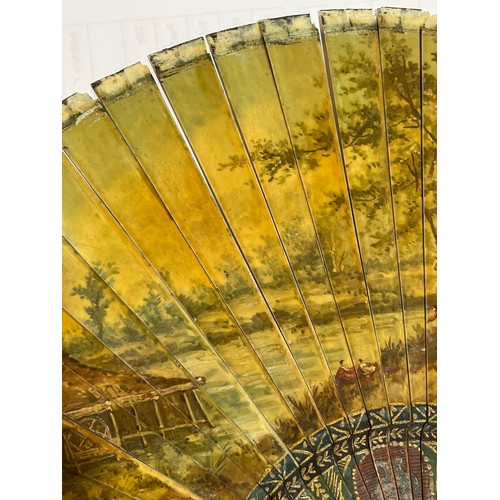 1185 - A 19th century hand painted ivory fan, length 18.5cm, and a bone arrow design fan with pierced decor... 