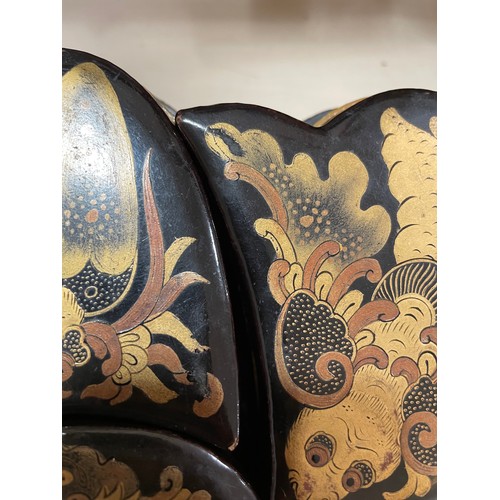 1052 - An unusual Chinese gilded and lacquered box in the form of a butterfly, the interior fitted with nes... 