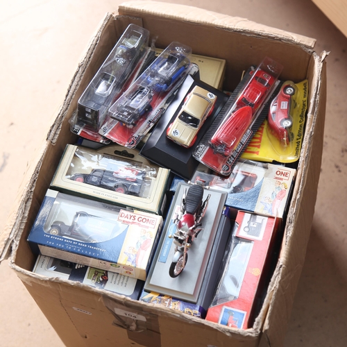 104 - A large quantity of various boxed diecast and plastic model toy vehicles and cars, including Days Go... 