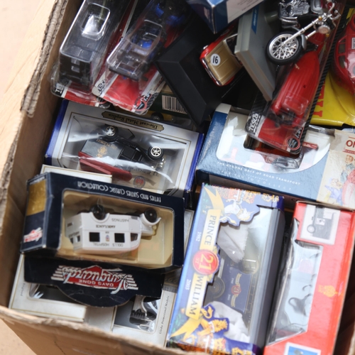 104 - A large quantity of various boxed diecast and plastic model toy vehicles and cars, including Days Go... 