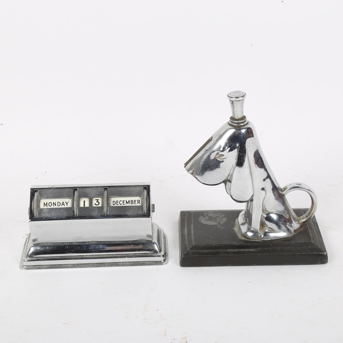 128 - An Art Deco Ronson chrome plated Dismal Desmond dog table lighter, and chrome plate desk calendar (2... 