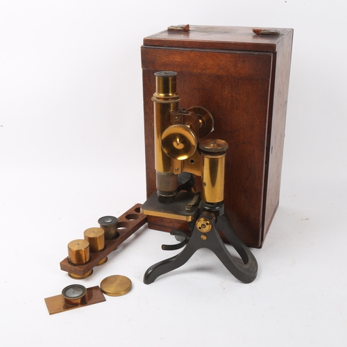 144 - A 19th century Henry Crouch brass compound microscope no. 7245, with 2 spare lenses, in original tra... 