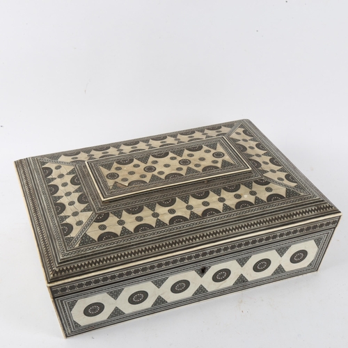 150 - A 19th century Anglo-Indian Vizagapatam bone and ivory sewing workbox, 33cm x 23cm