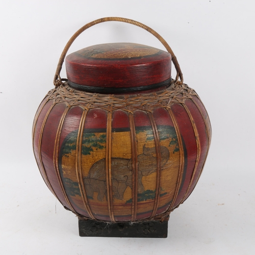 152 - An Oriental lacquered caned and painted food carrying vessel, height 30cm