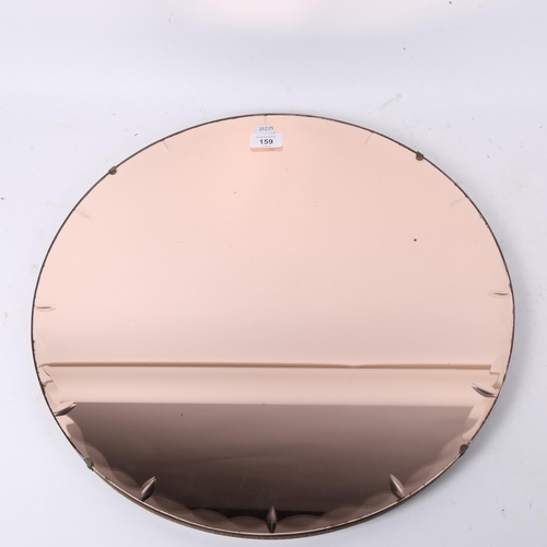 159 - An Art Deco peach glass circular wall mirror, diameter 50cm