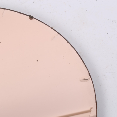 159 - An Art Deco peach glass circular wall mirror, diameter 50cm