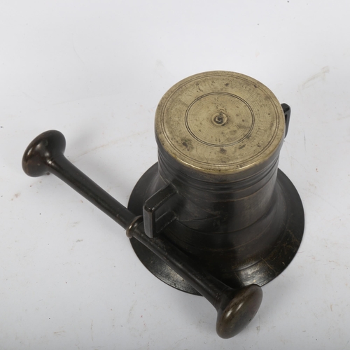 192 - An Antique polished bronze pestle and mortar, mortar height 12cm