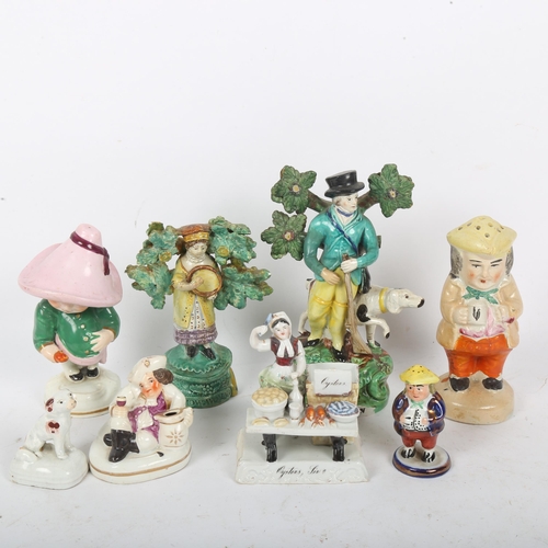 196 - Various 19th century figural ceramics, including Toby pepperette, oyster seller, sportsman etc (8)