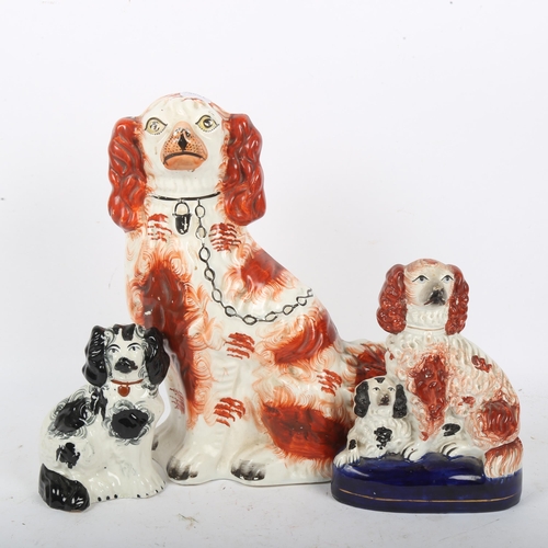 197 - 3 x 19th century Staffordshire Spaniels, largest height 31cm (3)