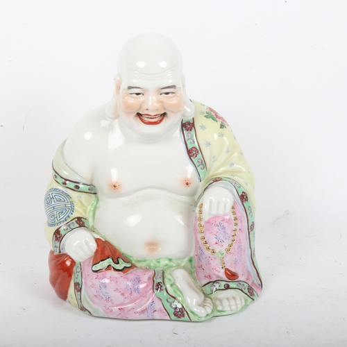 199 - A Chinese hand painted enamelled porcelain seated Buddha, height 21cm