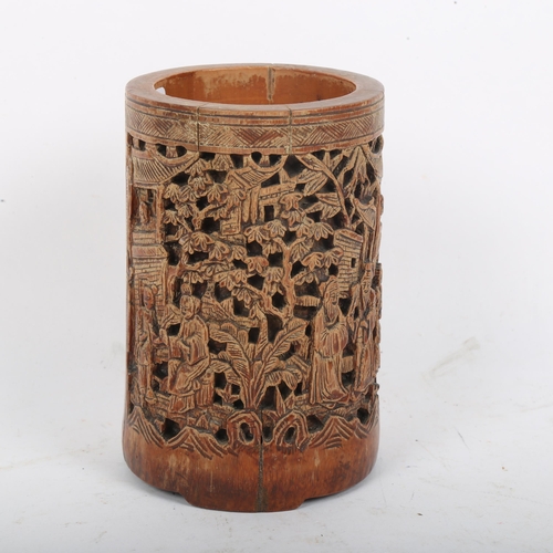 200 - A Chinese bamboo brush pot, relief carved and pierced decoration with character mark, height 13cm