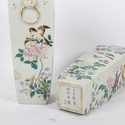 207 - A pair of Japanese hand painted square-section vases, bird decoration with lion ring handles, charac... 