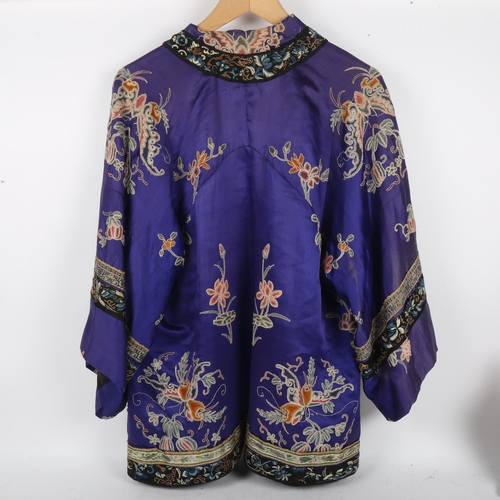 210 - A Chinese purple ground silk embroidered Damask court jacket robe