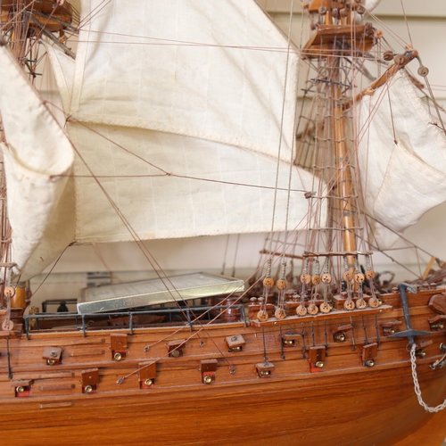 223 - A kit-built wooden hulled model Superbe French galleon ship, hull length 86cm, on stand