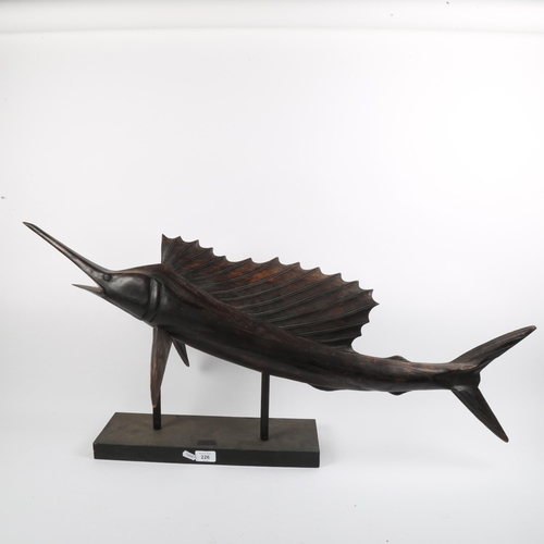 226 - A carved and painted oak sailfish sculpture, length 95cm