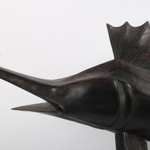 226 - A carved and painted oak sailfish sculpture, length 95cm