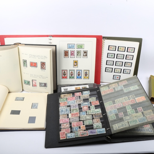 243 - A group of world postage stamp albums, including Malta, Canada and stock book