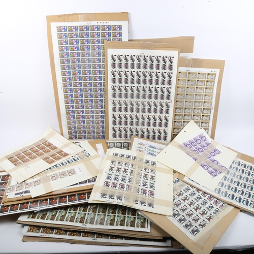 247 - A group of perforated postage stamp sheets