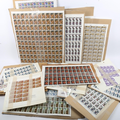 247 - A group of perforated postage stamp sheets