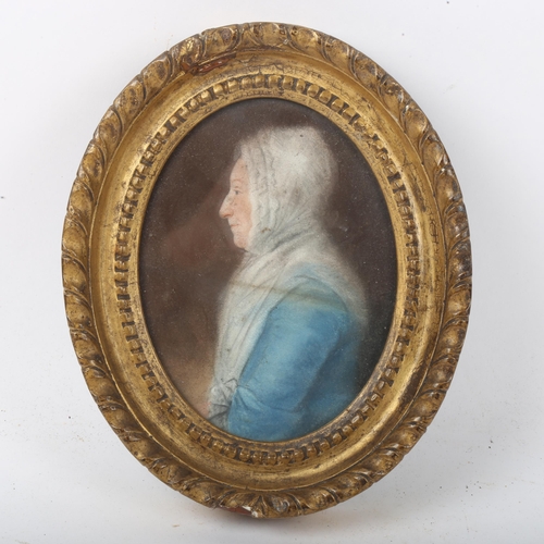 283 - A miniature portrait, female profile, gilt-metal oval frame, overall height 16cm