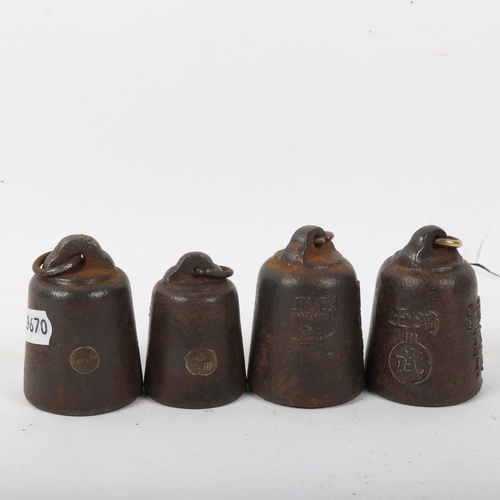 291 - A set of 4 Japanese balance scale weights, with character marks, largest height 6cm