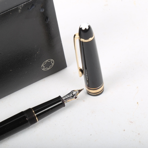 319 - MONT BLANC - a black lacquer Meisterstuck Pix fountain pen, serial no. XD2699804, boxed