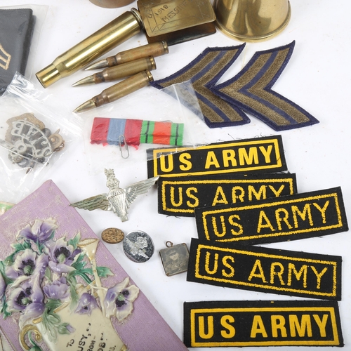 321 - Various First World War Period items, including Parachute Regiment cap badge, trench art, cannon she... 