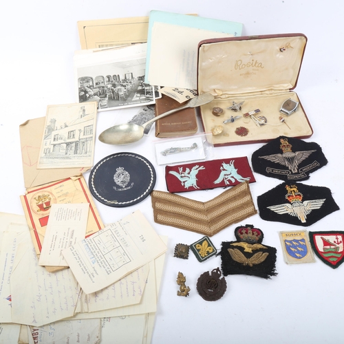 323 - Various military related items, including Royal Engineers badge, Parachute Regiment badge, engraved ... 