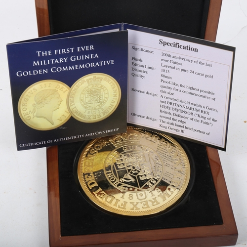 338 - A London Mint Office First Ever Military Guinea Golden Commemorative coin, limited edition of 1,813,... 