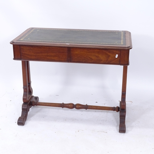 2032 - A 19th century mahogany writing desk, with a tooled green leather skiver and 2 frieze drawers on lyr... 