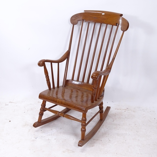 2256 - An elm-seated stick-back rocking chair