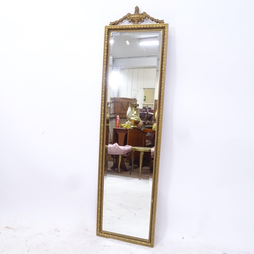 2265 - A rectangular bevel-edge wall mirror, with swag and urn pediment, W36cm, H135cm