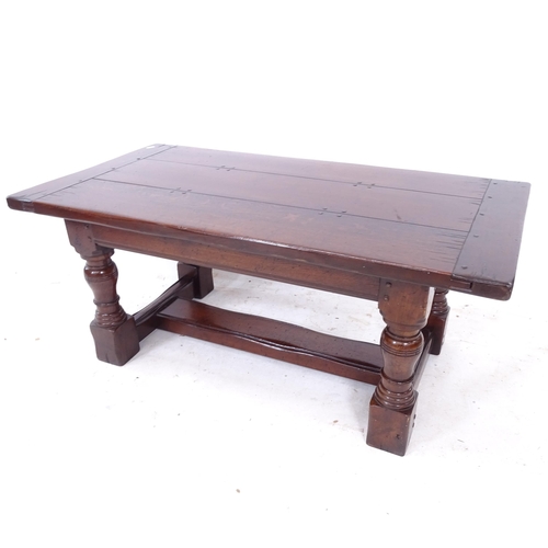 2272 - A 17th century style oak refectory coffee table, on baluster turned legs, W107cm, H45cm, D56cm