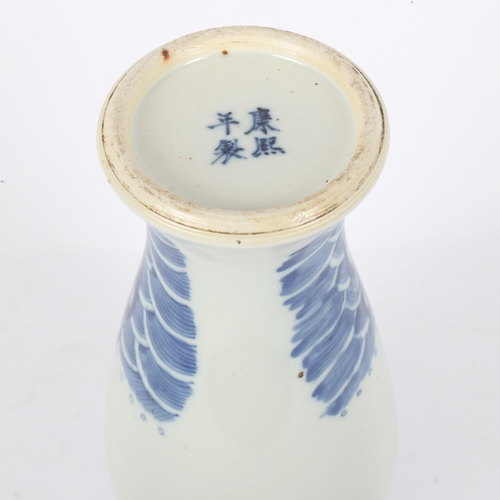 360 - A Chinese blue and white 'Temple' baluster vase, 4 character mark on base, height 29cm