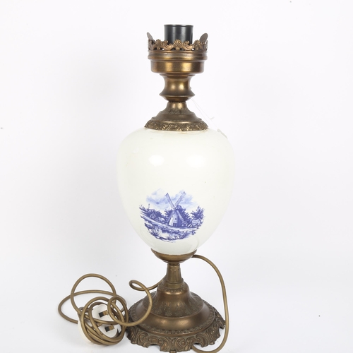 369 - Blue and white transfer decorated brass urn table lamp, height 44cm