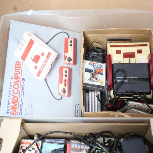 412 - A group of Vintage gaming consoles, including Atari video computer system, Commodore User, Commodore... 